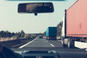 A line of trucks on the highway