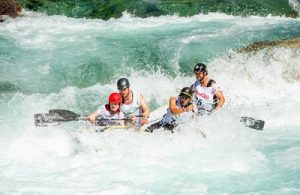 If you decide to privately visit South Carolina, you should do some kayaking in the foamy rapids, like this four-member family.