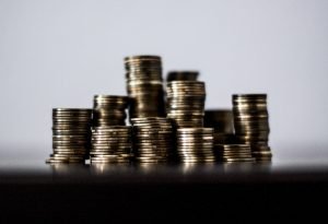 A lot of metal coins, plain, white background