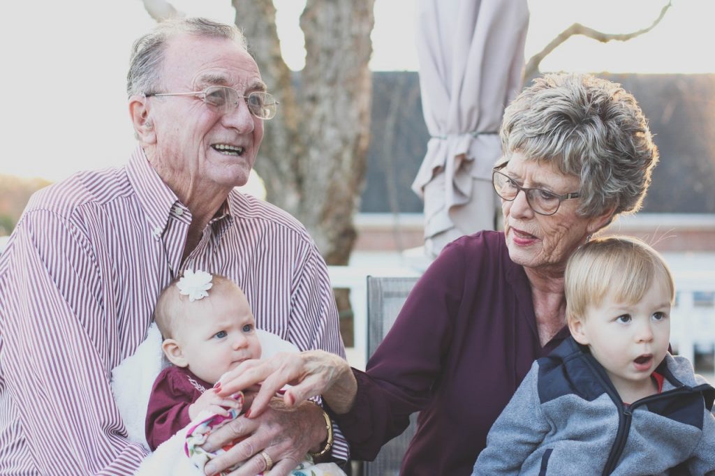 Seniors with their grand-kids