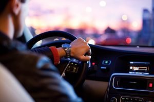 Close-up of a person driving.