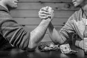 arm wrestling - Tennessee vs Kentucky - well, when it comes to costs of living they are both winners.
