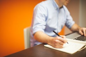 Man sitting at an office desk