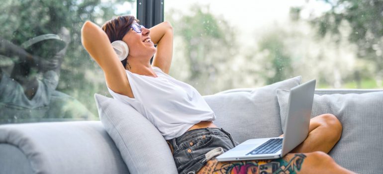 Woman sitting on couch