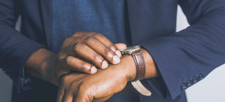 Man looking at wrist watch