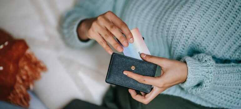 Girl holding a credit card.