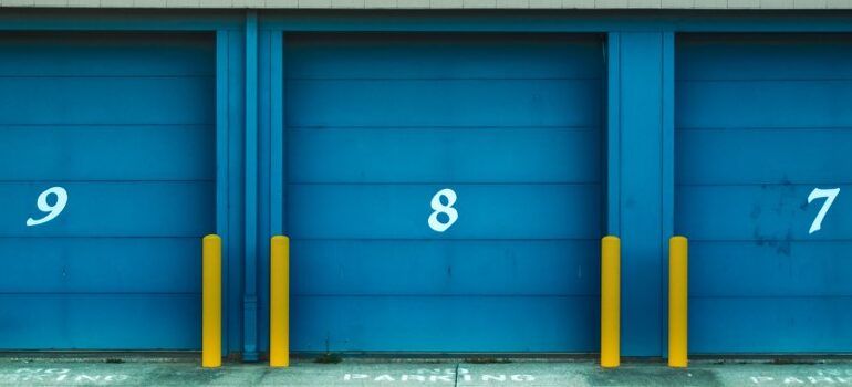 three storage units, numbered "9" "8" and "7"