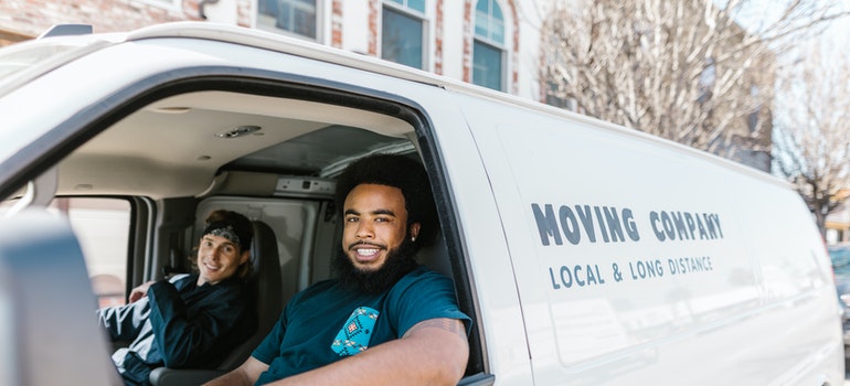 two guys in their moving van
