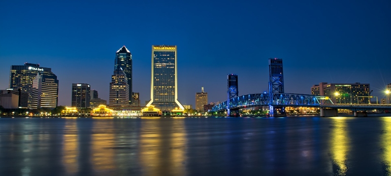 The skyline of Jacksonville, Florida at twilight, as viewed from across the St. John's River.