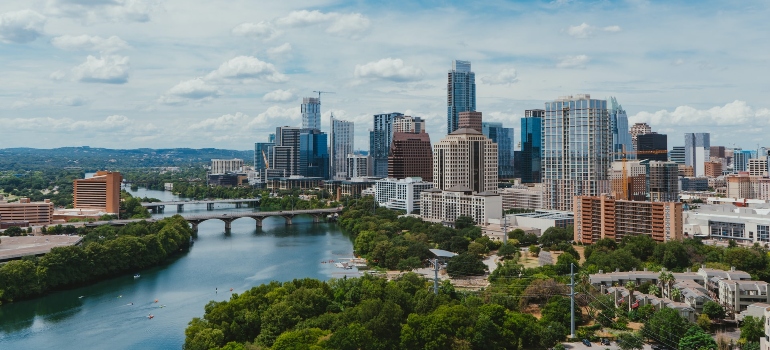 The cost of living in Austin, Texas – river, bridges, and buildings.
