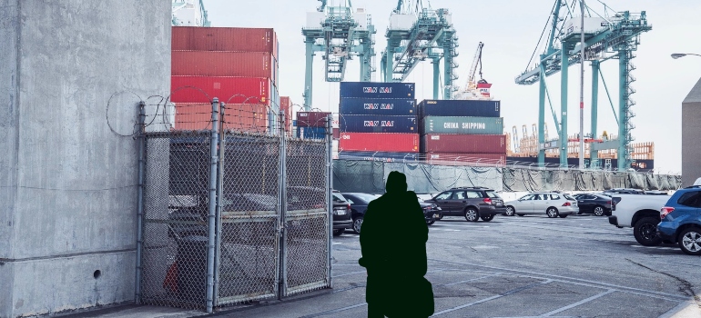 person standing at the cargo port
