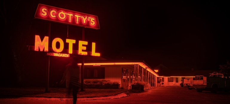 Motel sign and building during the night time.