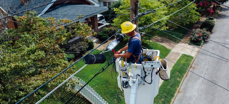 Man fixing electric line