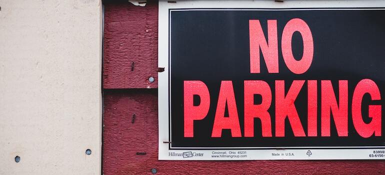 A no parking sign after someone got their moving permits