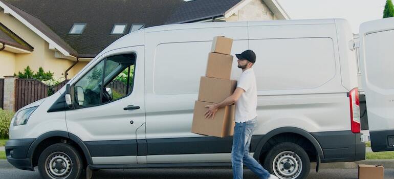 A mover unloading a van