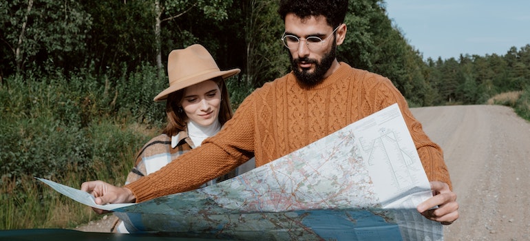 A couple looking at a map of Illinois