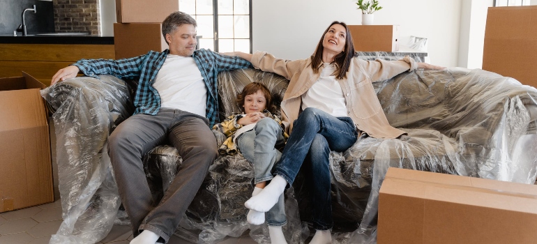Happy family sitting on a couch