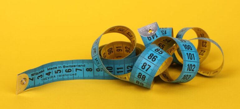 Blue and yellow measuring tape