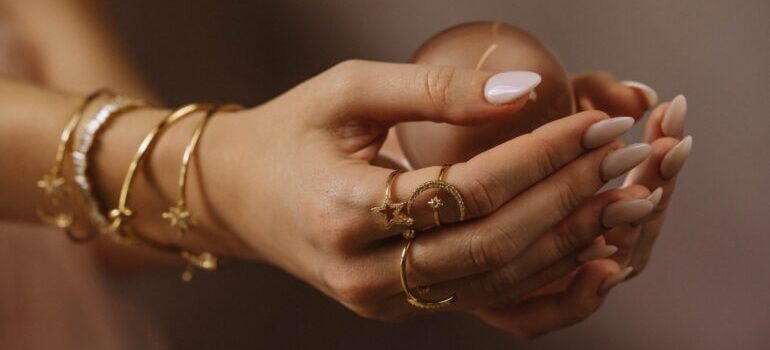 Hands with bracelets and rings