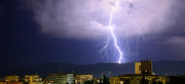 Lightning strike in the city at night