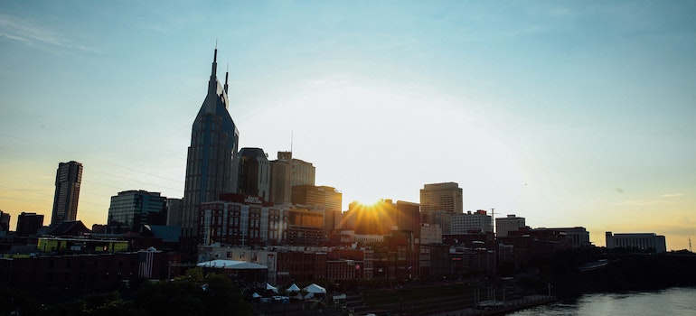 a photo of Nashville with the sun setting down