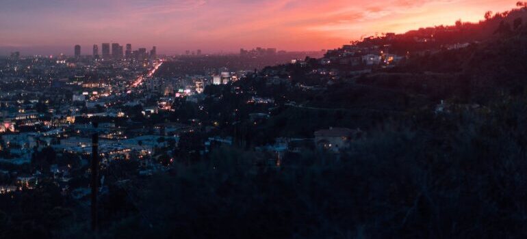 View from a hill at a city in California during sunset