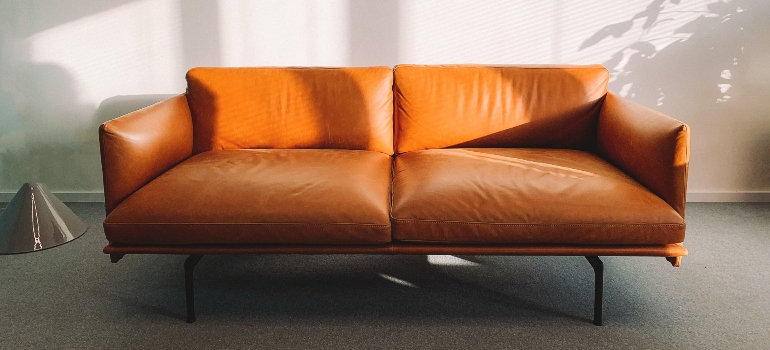 A brown leather sofa, which would benefit from climate-controlled vs. traditional storage