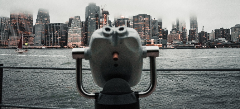 Vintage Binoculars looking at cloudy and rainy New York