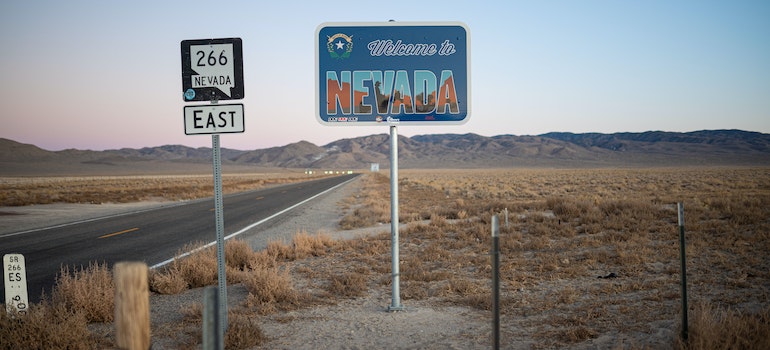welcome to Nevada sign on an interstate