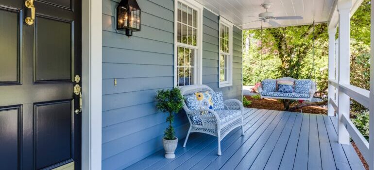 Porch of a new house with furniture, set up with the help of the best cross country movers Biddeford