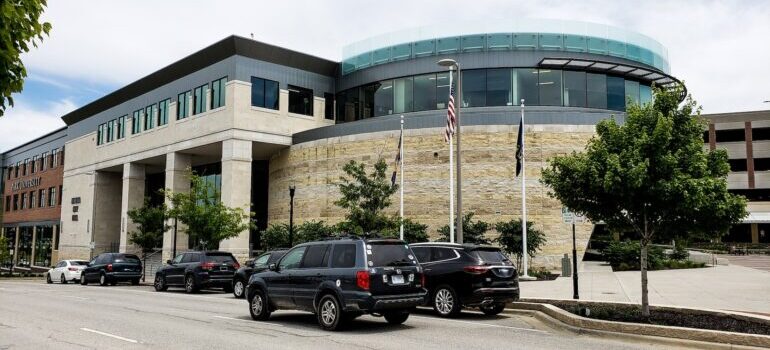 Building in Lenexa with many cars parked outside of it