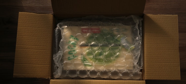 One way to protect your belongings from fall moisture during a move is by placing them in bubble wrap.