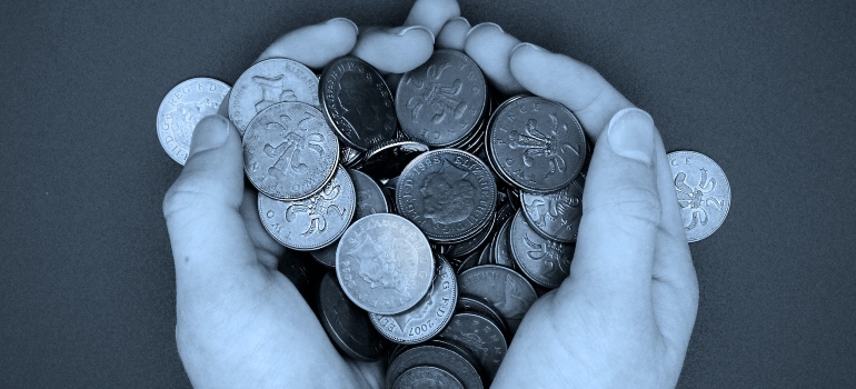 Picture of hands holding coins 