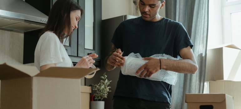 Picture of a two people packing items 