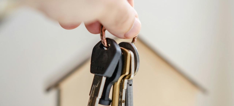 Picture of a person holding keys 