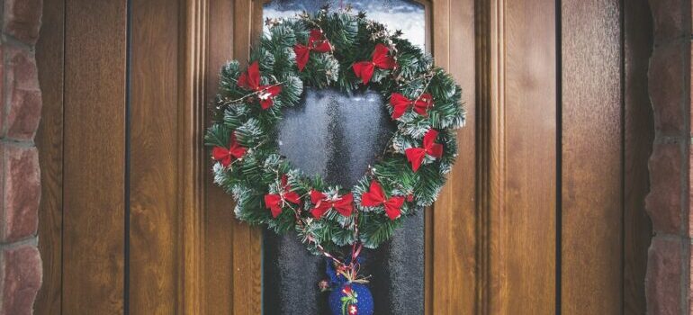 Green and red wreath on the door