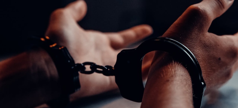 Picture of a person in handcuffs 
