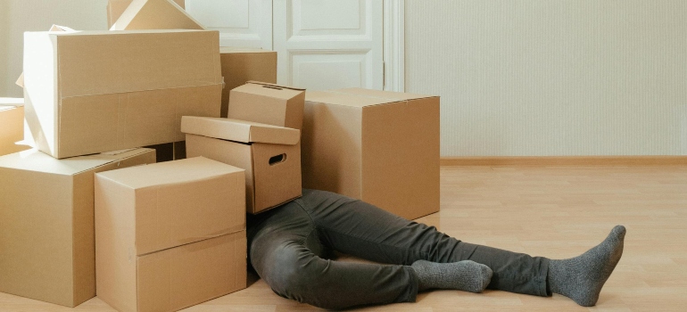 man lying and thing about things people often forget when moving