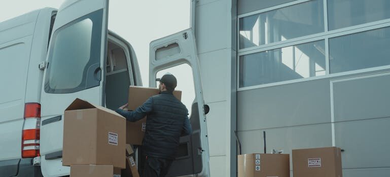 A man loafing a truck